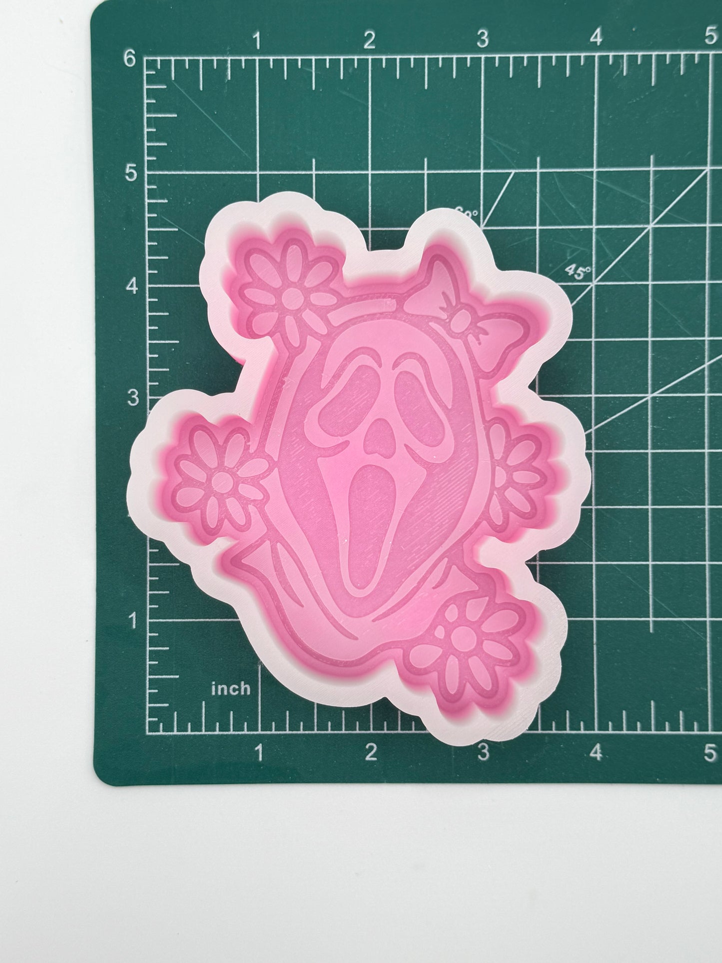 Scare Face with Flowers freshie mold | silicone freshie mold